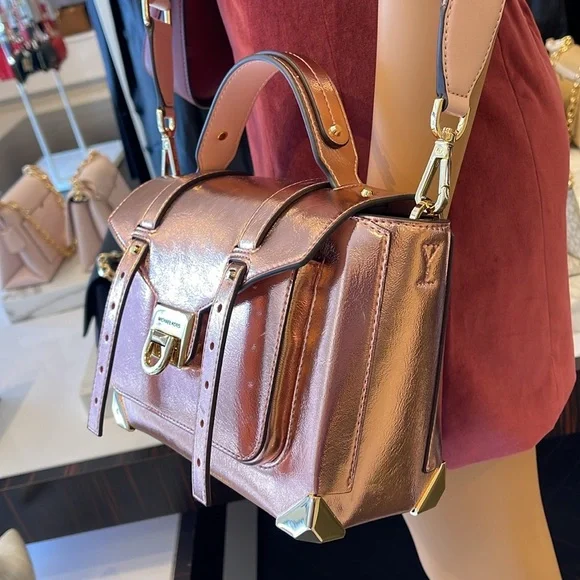 MICHAEL KORS
Manhattan Md TH SCHOOL Crackled Metallic Leather SATCHEL
Primrose - Picture 3 of 16